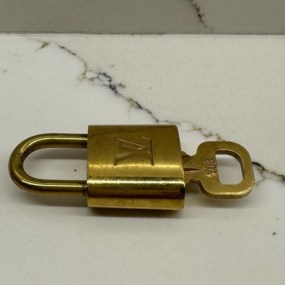 Louis Vuitton gold Padlock Keychain #304 used in excellent condition. - Picture 5 of 5